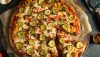 cheeseburger-pizza_brent hofacker via AdobeStock_141903581.jpg