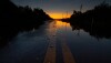 early morning flooded road from hurricane ian_Photo by pelow media_AdobeStock_537370206.jpg